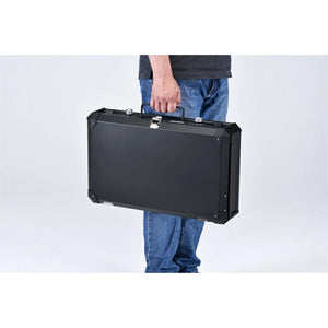 Uniflame Twin Burner US‑1900 folded flat with carry handle for compact storage